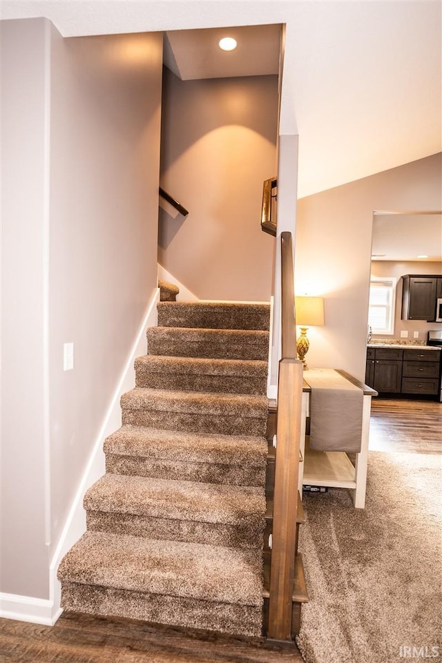 2014 Buell Dr, Angola, IN 46703 - stairway with baseboards, wood finished floors, and recessed lighting