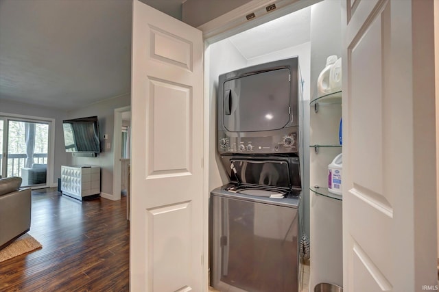 1881 E Eagle Bay Dr, Bloomington, IN 47401 - washroom with stacked washer / drying machine, wood finished floors, and baseboards