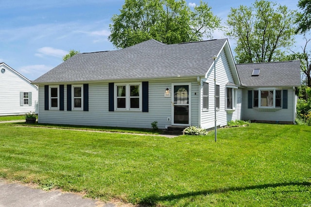 217 Vasbinder Dr, Anderson, IN 46017 - view of front facade featuring a front lawn, a shingled roof, and entry steps