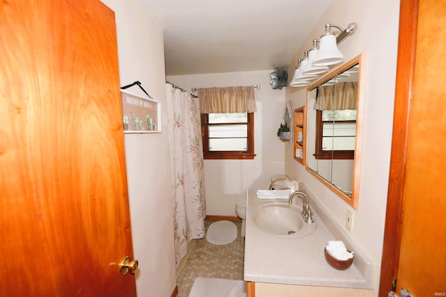 328 N Harding Ave, Mishawaka, IN 46544 - bathroom with toilet, vanity, tile patterned flooring, and a shower with curtain