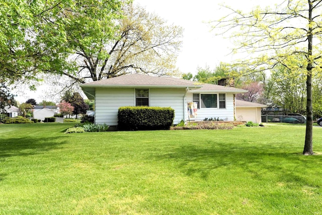 328 N Harding Ave, Mishawaka, IN 46544 - view of front facade featuring a front yard, a chimney, and roof with shingles