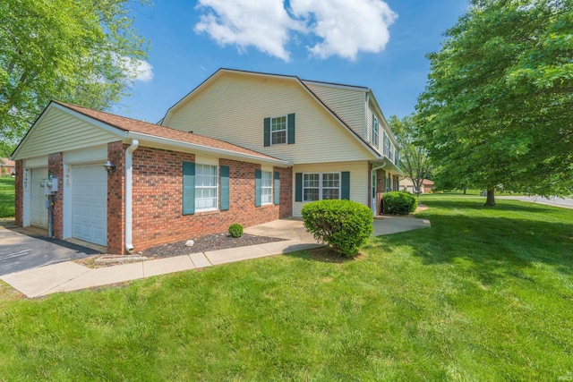 3417 S Westminster Way, Bloomington, IN 47401 - view of front of property featuring brick siding, a garage, a front yard, driveway, and a gambrel roof