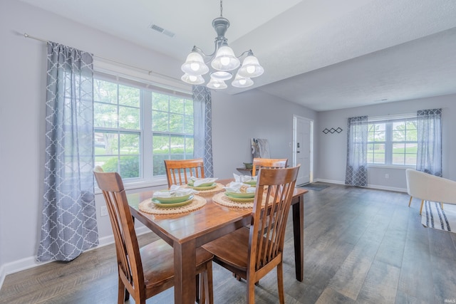 3417 S Westminster Way, Bloomington, IN 47401 - dining room featuring a chandelier, wood finished floors, and baseboards