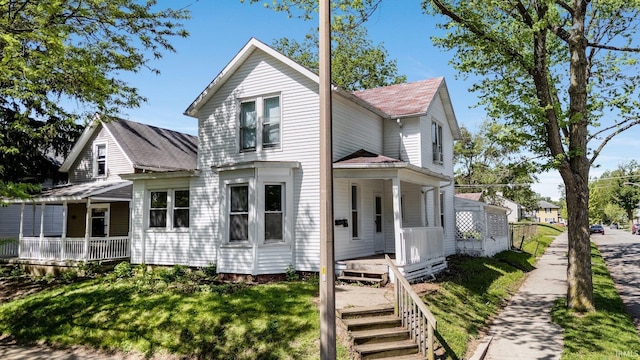 1437 Oakland St, Fort Wayne, IN 46808 - view of front facade with covered porch and a shingled roof