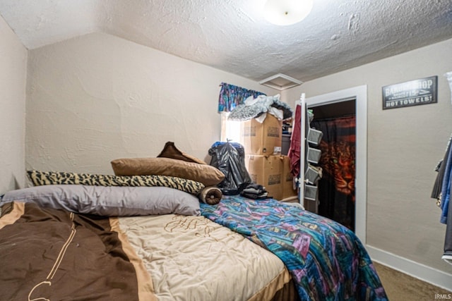 1437 Oakland St, Fort Wayne, IN 46808 - carpeted bedroom featuring a textured ceiling, baseboards, and a closet