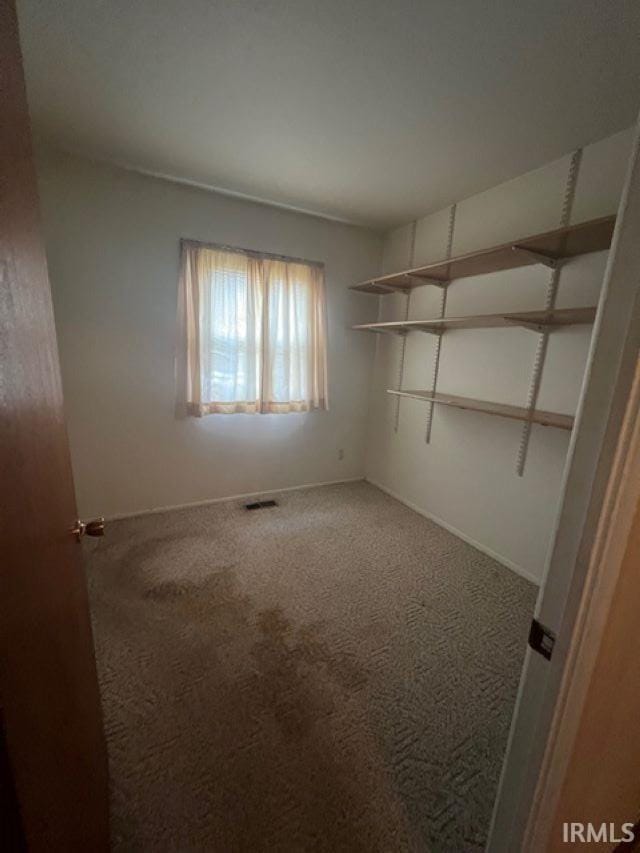 406 E Maple St, Attica, IN 47918 - carpeted spare room with baseboards