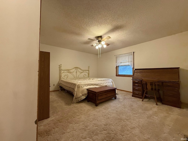 6311 N Camp Arthur Rd, Bruceville, IN 47516 - bedroom with a textured ceiling, carpet flooring, baseboards, and a ceiling fan