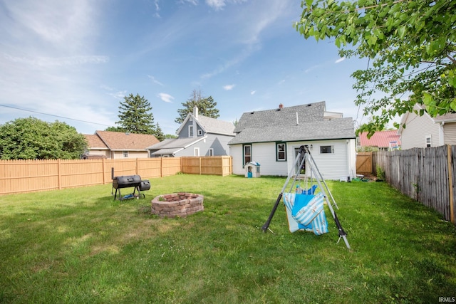 1422 Virginia St, Lafayette, IN 47905 - back of house with a fire pit and roof with shingles