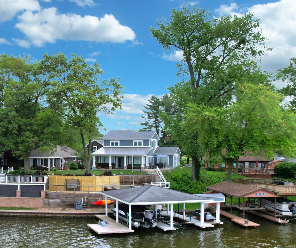 3380 N Shore Acres Ct, Monticello, IN 47960 - dock with boat lift and a water view