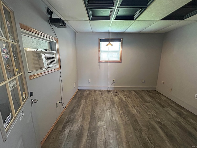 214 S Cedar St, Loogootee, IN 47553 - spare room featuring wood finished floors, cooling unit, and baseboards