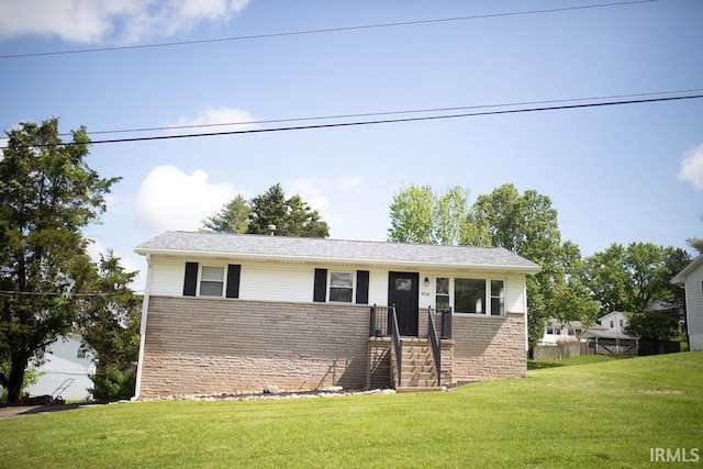 904 Hall Ave, Oolitic, IN 47446 - ranch-style house with a front lawn and brick siding