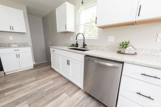 904 Hall Ave, Oolitic, IN 47446 - kitchen with dishwasher, a sink, white cabinets, and light wood finished floors