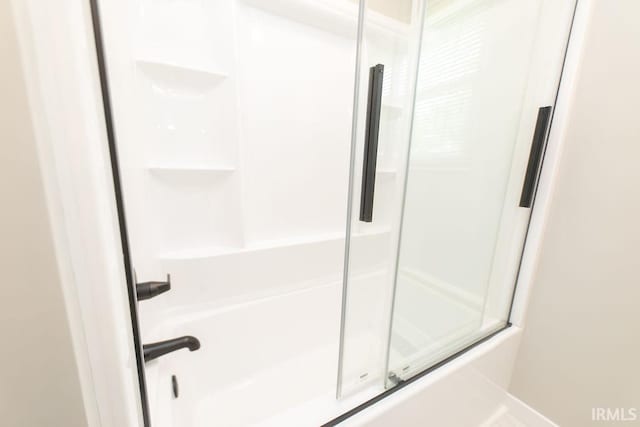 904 Hall Ave, Oolitic, IN 47446 - bathroom with bath / shower combo with glass door and baseboards