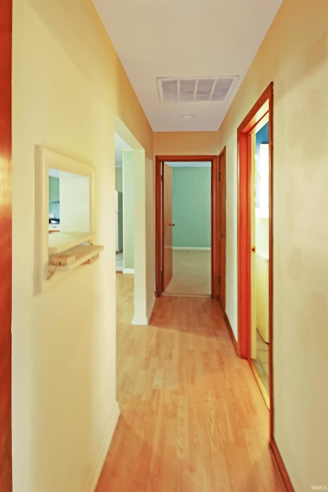 2301 E Delaware St, Evansville, IN 47711 - hall featuring light wood-type flooring and baseboards
