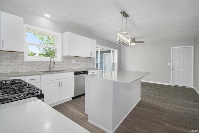 10974 County Road 10, Middlebury, IN 46540 - kitchen with a sink, dishwasher, tasteful backsplash, dark wood-style flooring, and light countertops