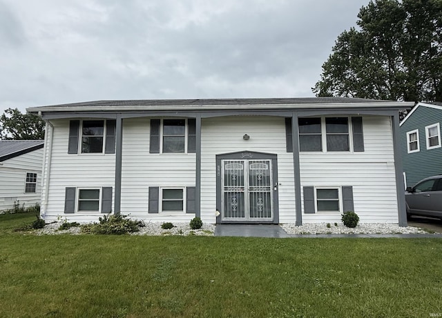 2208 Baton Rouge Dr, Kokomo, IN 46902 - bi-level home featuring a front lawn
