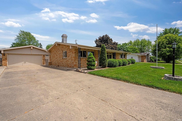 1300 Belvedere Dr, Kokomo, IN 46902 - single story home featuring brick siding, a front yard, an outbuilding, a chimney, and a garage
