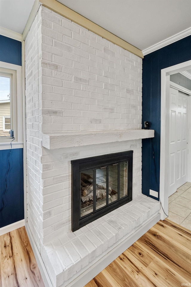 1300 Belvedere Dr, Kokomo, IN 46902 - detailed view of crown molding, a fireplace, and wood finished floors