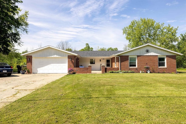 1400 W County Road 1200 N, Muncie, IN 47303 - ranch-style house featuring an attached garage, brick siding, concrete driveway, and a front yard