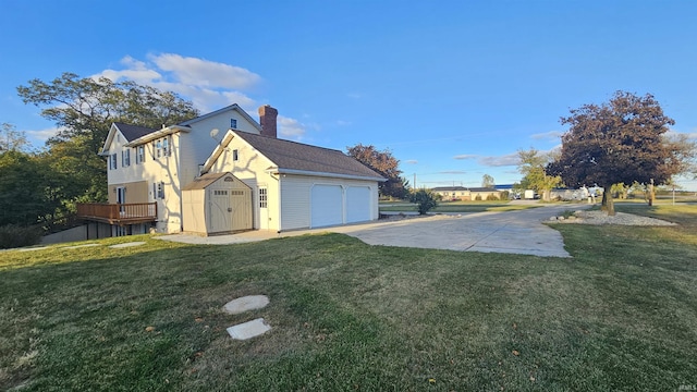 7019 Bull Rapids Rd, Woodburn, IN 46797 - view of home's exterior featuring a garage, a chimney, and a yard