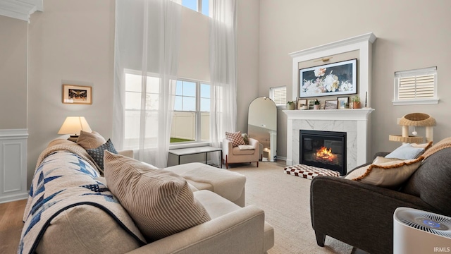 5263 Gadwall Pass, Fort Wayne, IN 46818 - living room featuring a towering ceiling and a tiled fireplace