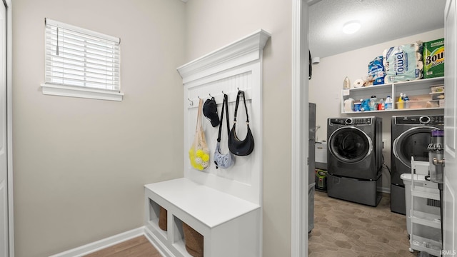 5263 Gadwall Pass, Fort Wayne, IN 46818 - laundry area with washer and clothes dryer and baseboards