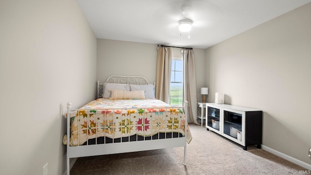 5263 Gadwall Pass, Fort Wayne, IN 46818 - carpeted bedroom with baseboards and a ceiling fan