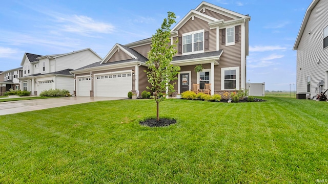 5263 Gadwall Pass, Fort Wayne, IN 46818 - view of front of house with an attached garage, concrete driveway, and a front yard