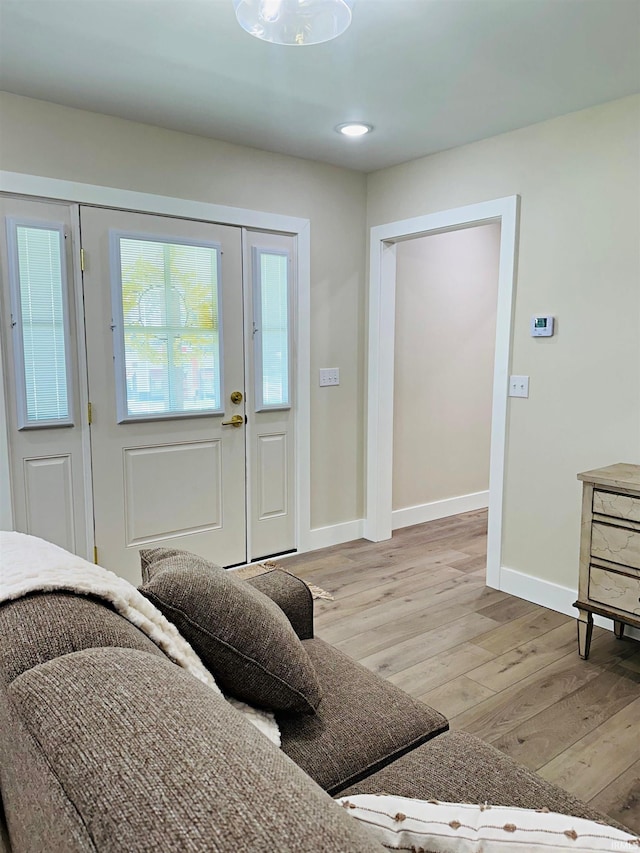 1412 E National Hwy, Washington, IN 47501 - foyer with light wood-style floors and baseboards