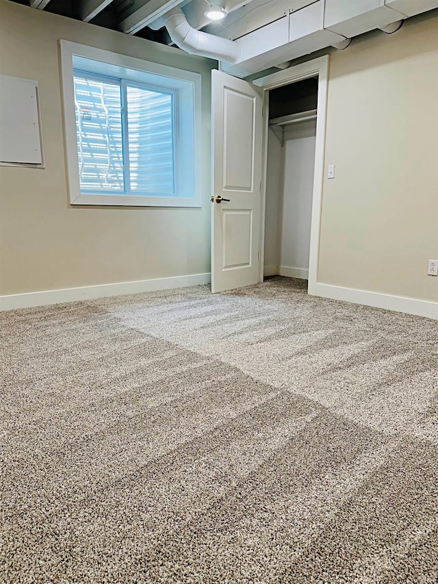 1412 E National Hwy, Washington, IN 47501 - unfurnished bedroom with a closet, baseboards, and carpet floors
