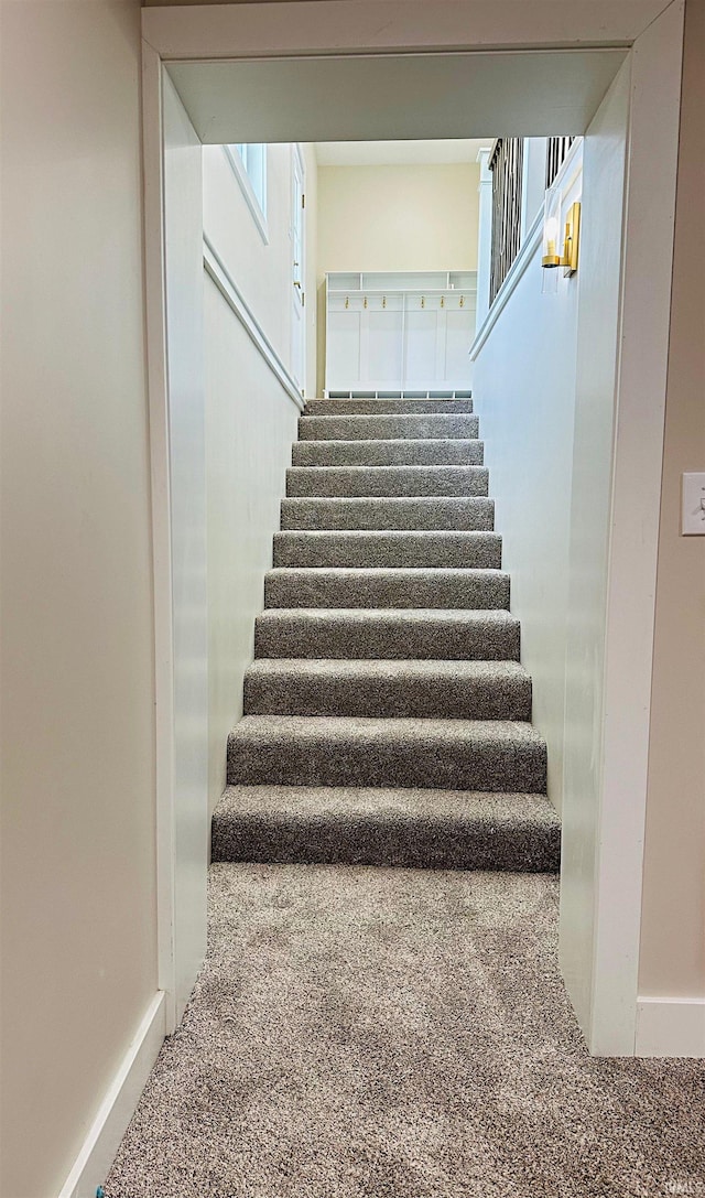 1412 E National Hwy, Washington, IN 47501 - staircase with carpet floors and baseboards