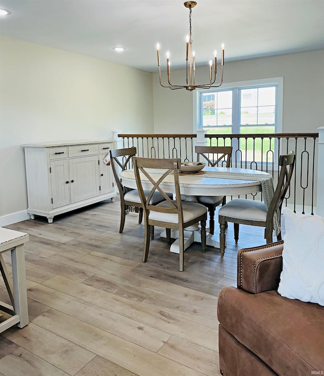 1412 E National Hwy, Washington, IN 47501 - dining room with a chandelier, light wood-style floors, and recessed lighting