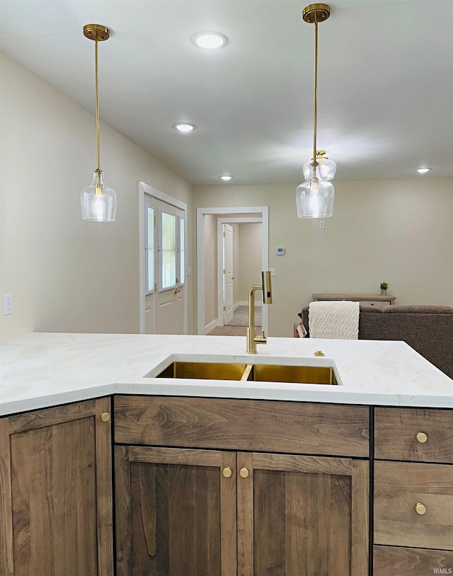 1412 E National Hwy, Washington, IN 47501 - kitchen featuring a sink, light countertops, decorative light fixtures, and recessed lighting
