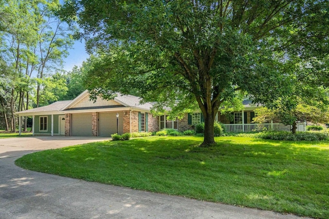 1395 E 75 N, Lagrange, IN 46761 - single story home with a garage, a front lawn, concrete driveway, and brick siding