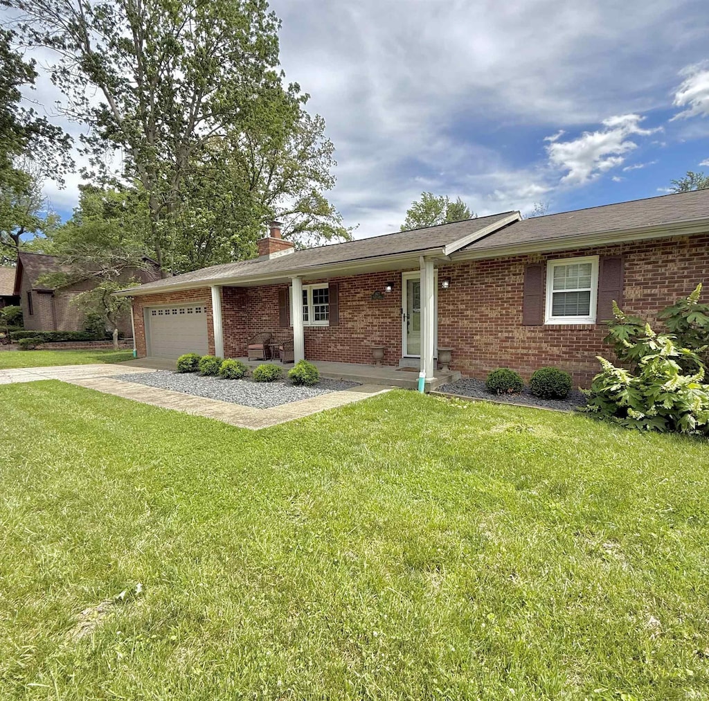 7677 Georgia Ln, Newburgh, IN 47630 - ranch-style house featuring brick siding, a garage, a front lawn, and a chimney