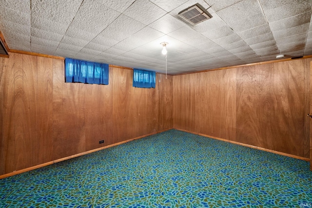 1212 Michigan Ave, Mishawaka, IN 46544 - finished below grade area featuring carpet and wooden walls