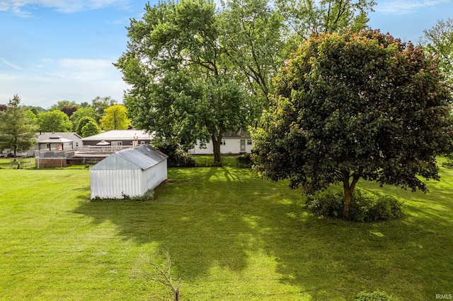 1212 Michigan Ave, Mishawaka, IN 46544 - view of green lawn with an outbuilding