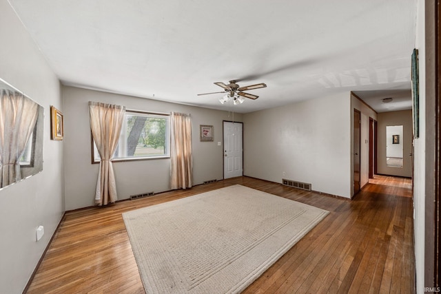 1212 Michigan Ave, Mishawaka, IN 46544 - empty room featuring a ceiling fan and hardwood / wood-style floors
