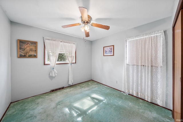 1212 Michigan Ave, Mishawaka, IN 46544 - unfurnished bedroom with carpet floors and ceiling fan