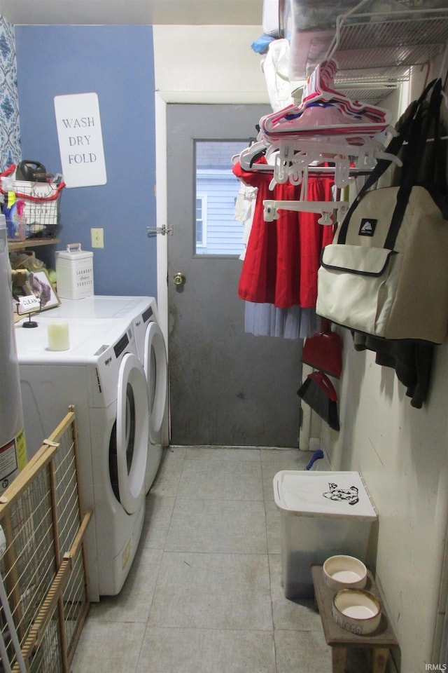1908 E 18th St, Muncie, IN 47302 - laundry area with washer and clothes dryer and light tile patterned floors