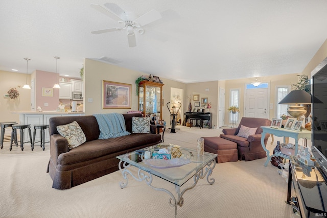 3441 Brantley Dr, New Haven, IN 46774 - living area with light carpet and ceiling fan