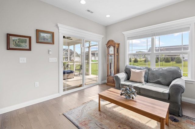 1159 Chesapeake Pointe Dr, Lafayette, IN 47909 - living room with baseboards, wood finished floors, and recessed lighting