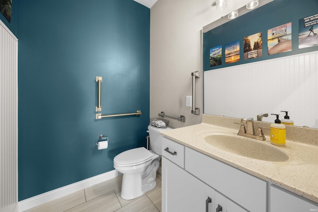 1159 Chesapeake Pointe Dr, Lafayette, IN 47909 - half bathroom featuring toilet, vanity, tile patterned floors, and baseboards