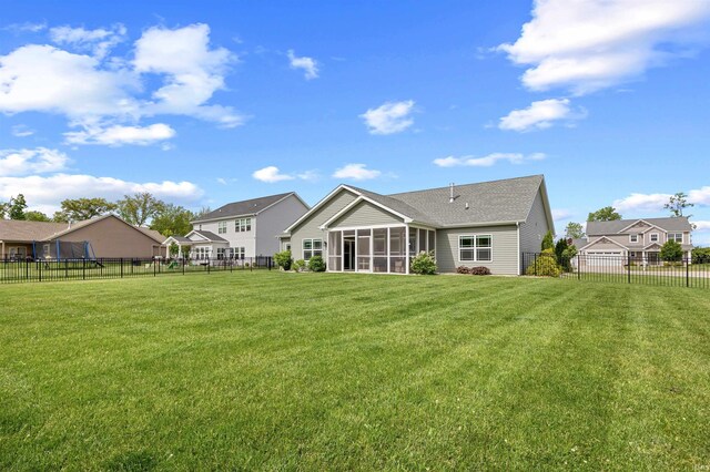 1159 Chesapeake Pointe Dr, Lafayette, IN 47909 - back of property with a sunroom