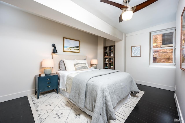 112 W Washington Blvd Unit 232, Fort Wayne, IN 46802 - bedroom featuring baseboards, ceiling fan, and light wood finished floors