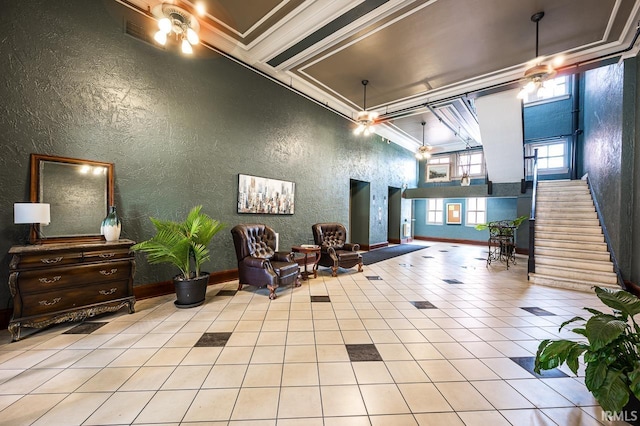 112 W Washington Blvd Unit 232, Fort Wayne, IN 46802 - common area featuring a textured wall, stairs, and ornamental molding