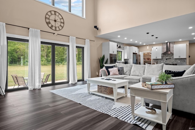 30474 Jaxon Dr, Elkhart, IN 46517 - living room with dark wood finished floors, a towering ceiling, and recessed lighting