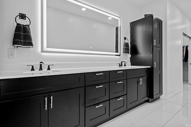 30474 Jaxon Dr, Elkhart, IN 46517 - bathroom featuring tile patterned flooring, double vanity, and recessed lighting
