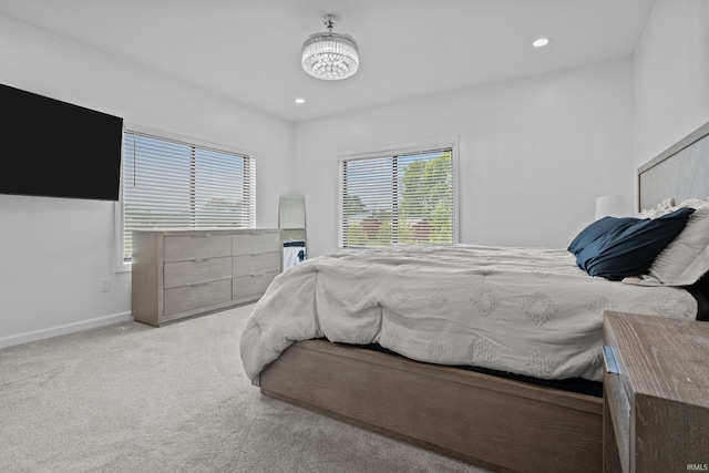 30474 Jaxon Dr, Elkhart, IN 46517 - carpeted bedroom with a chandelier, recessed lighting, and baseboards