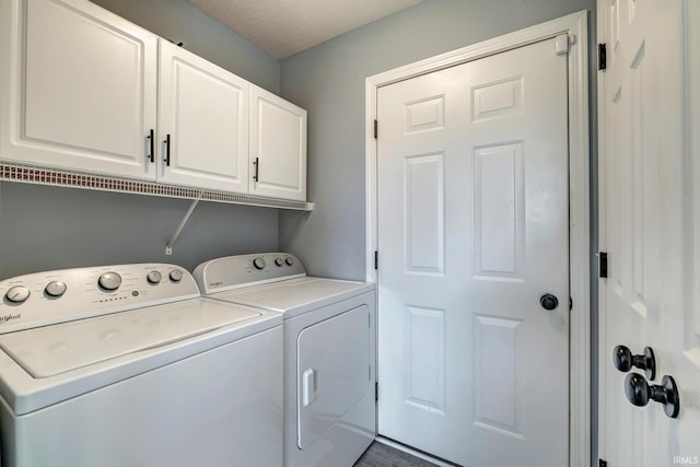 3063 N Natasha Dr, Bloomington, IN 47404 - laundry area with cabinet space and washer and dryer
